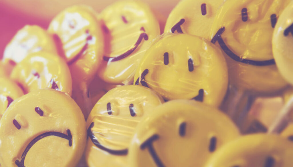 stock-photo-yellow-candy-depression-retro-smile-sad-happy-smiley-lollipop-56255467-ee2b-46ab-aa62-1a9e1b86676c-1