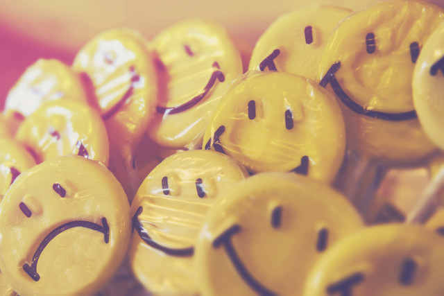 stock-photo-yellow-candy-depression-retro-smile-sad-happy-smiley-lollipop-56255467-ee2b-46ab-aa62-1a9e1b86676c-1